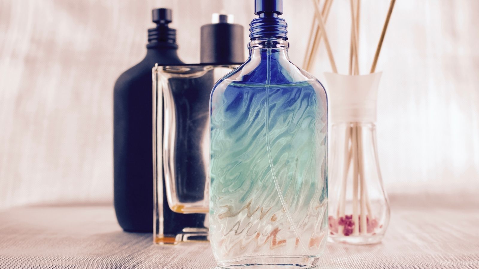 A simple bookshelf is a perfect place to store your perfume bottles!
