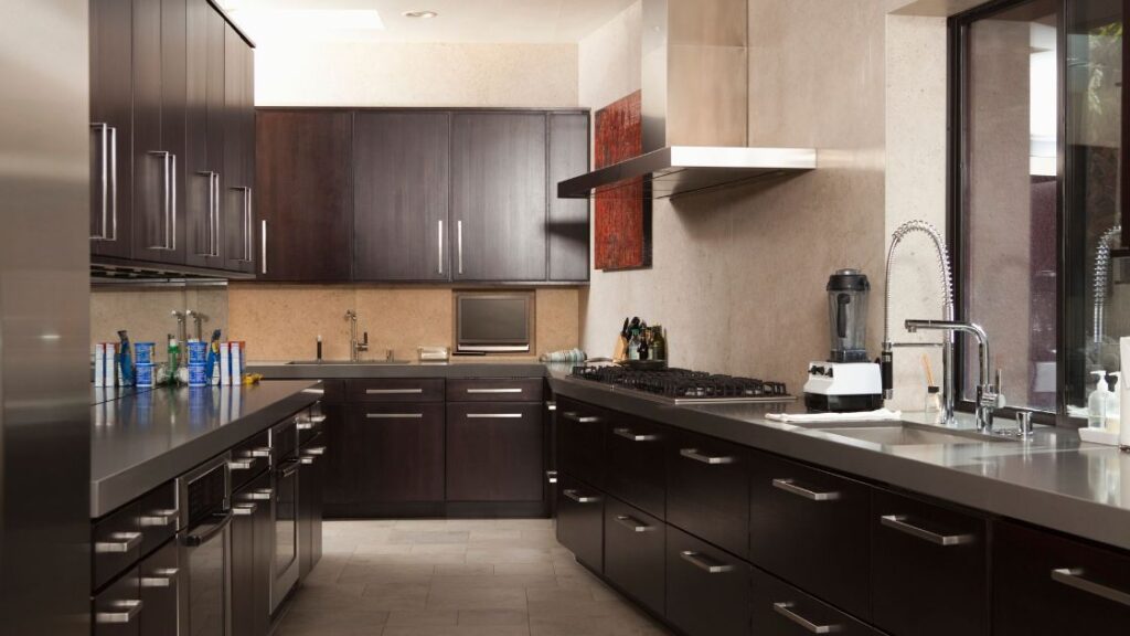 Kitchen with dark countertops